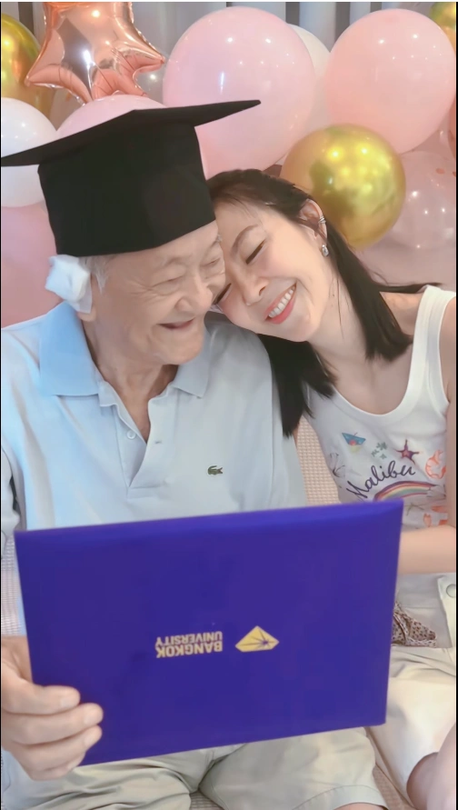 Photo of the daughter, Bew, smiling happily after her father's viral matchmaking efforts.