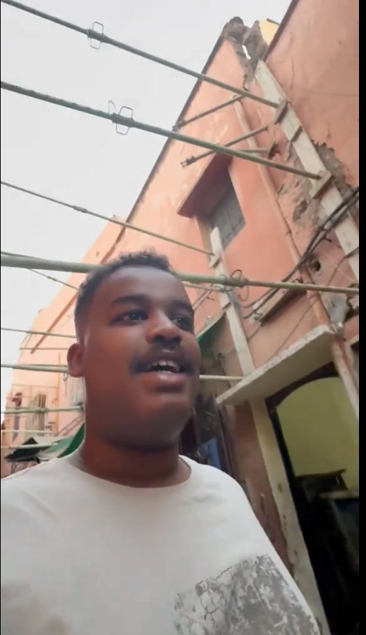  A shopper browsing supermarket aisles with expensive price tags on display.