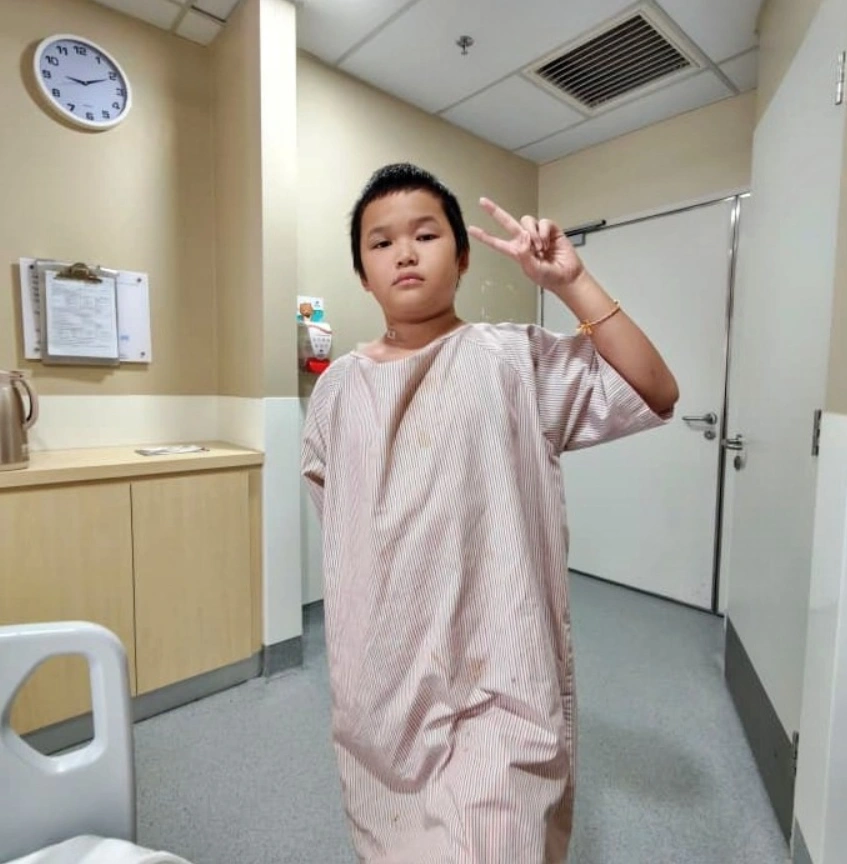 10-year-old boy donating bone 