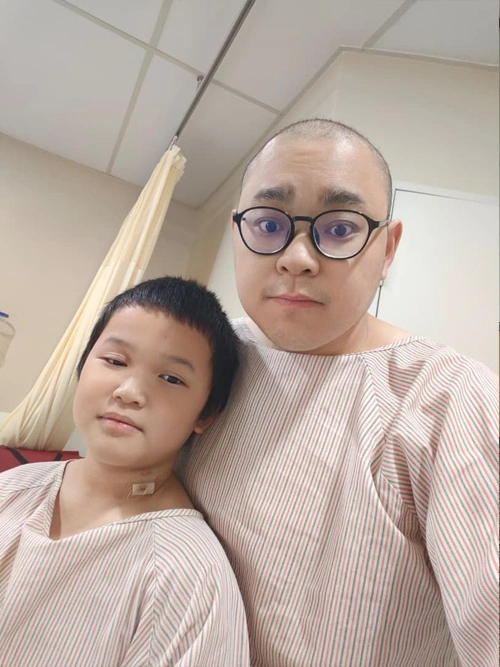 Successful bone marrow transplant recovery and family support in hospital ward.