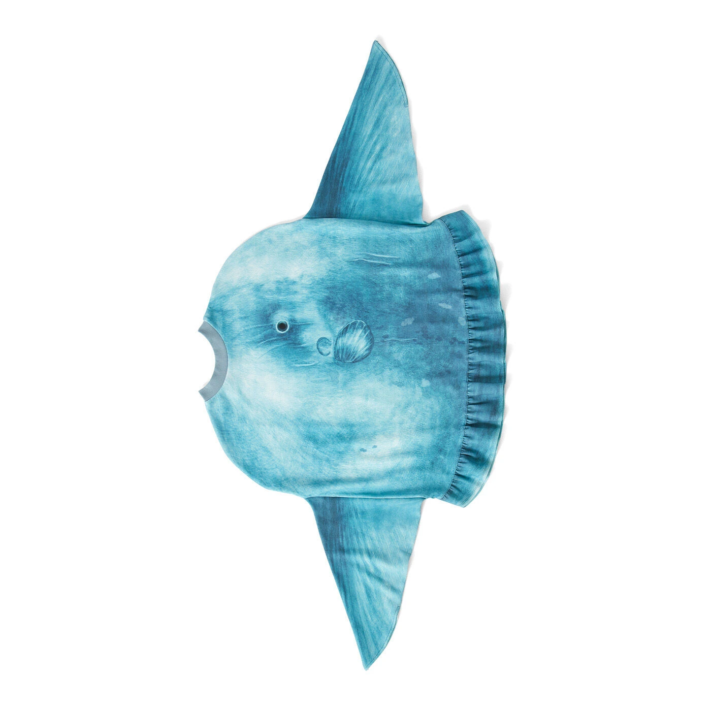 A model wearing the giant, grey knitted Ocean Sunfish (Mola Mola) sweater from Japan, with arms extended into the fins to show its unique shape and face design.