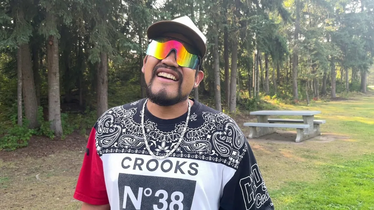 Kingston Police cruiser emergency lights flashing at night.