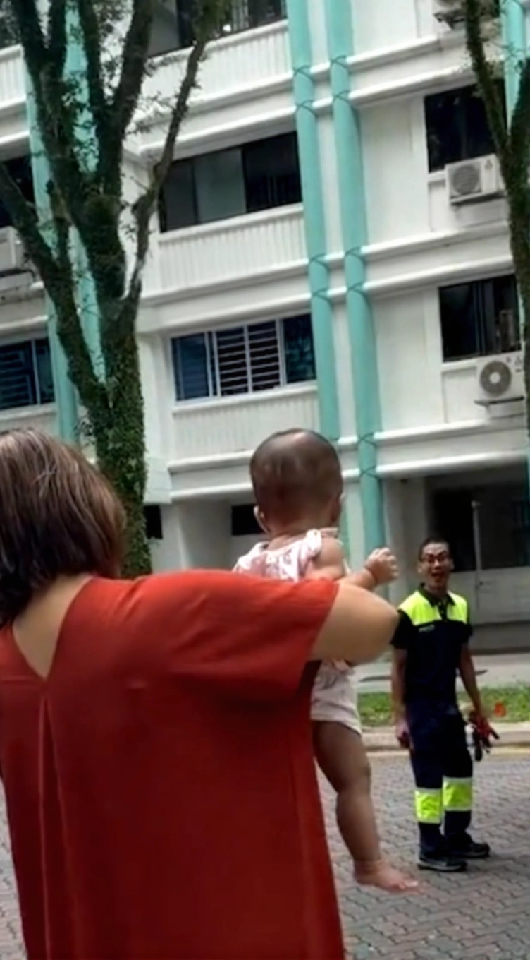 Emotional interaction between a hardworking father on duty and his young daughter in Singapore.